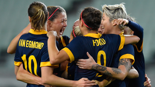 Matildas players celebrate Michelle Heyman's first-half strike against DPR Korea.