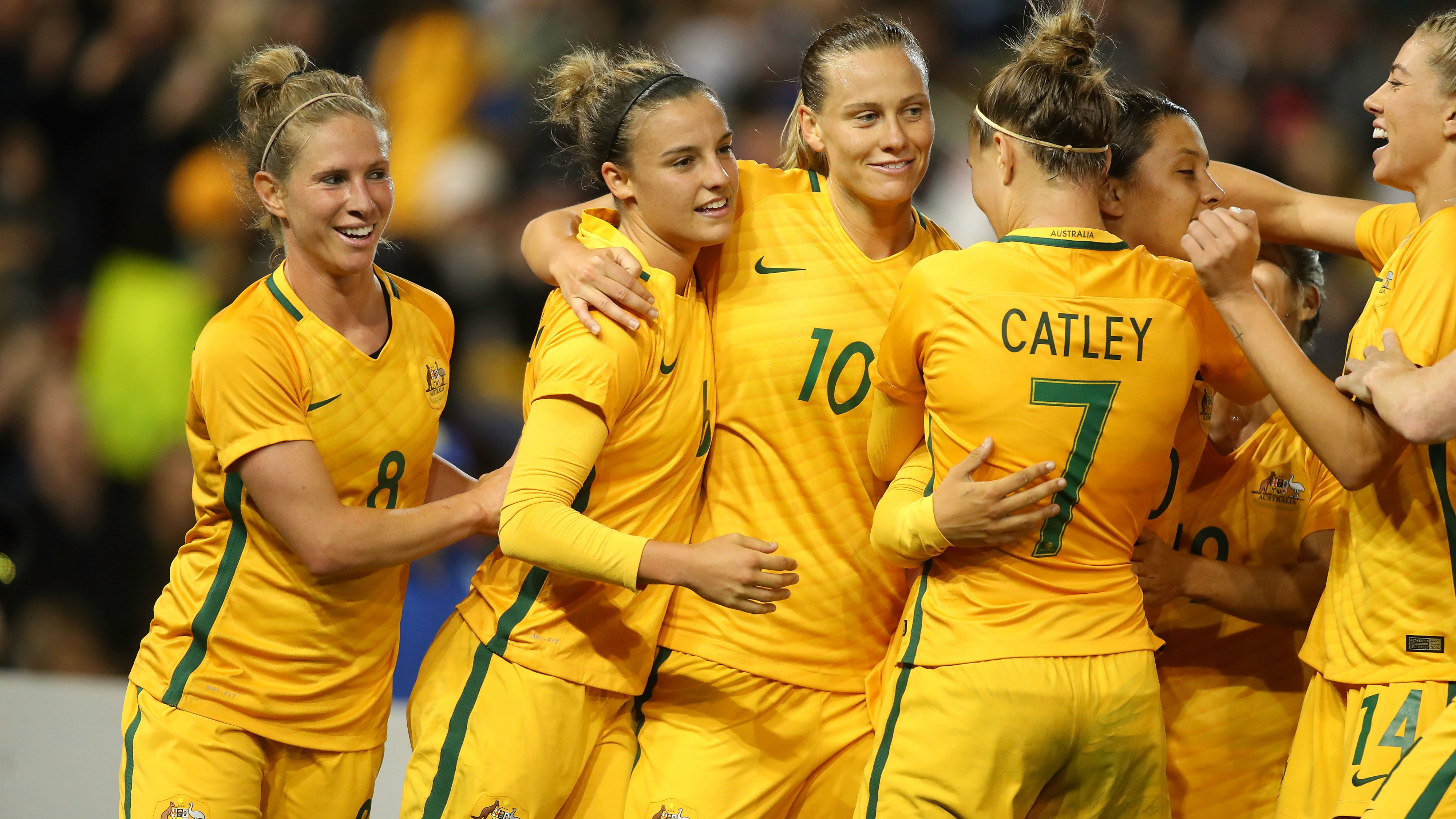 Westfield Matildas players celebrate a goal in their 3-2 win over Brazil in Newcastle.