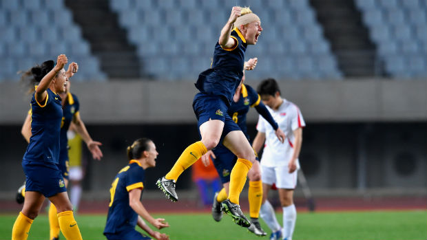 Co-captain Clare Polkinghorne leads the celebrations following the Matildas' win over DPR Korea.