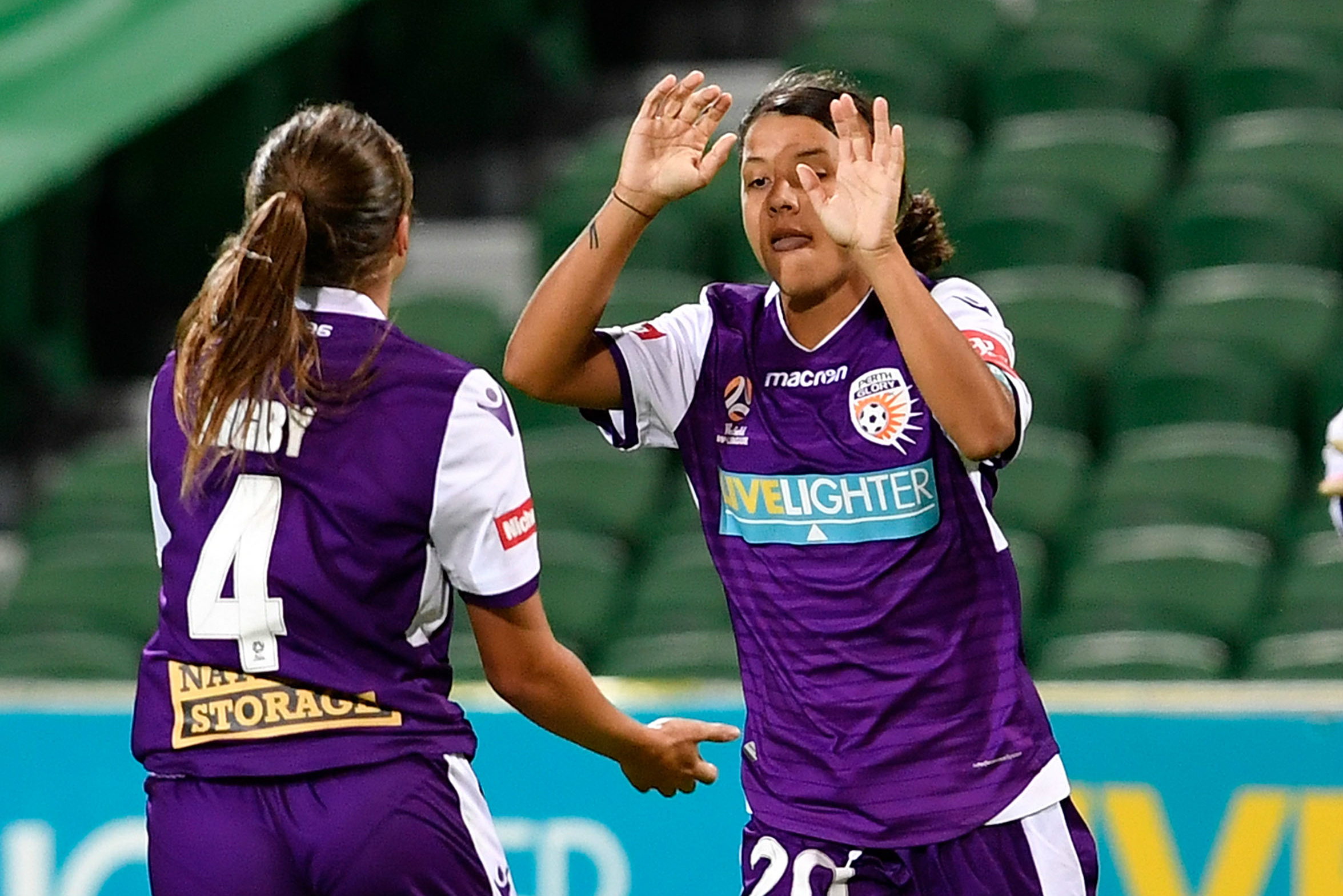 Sam Kerr celebrates one of her two goals against the Wanderers.