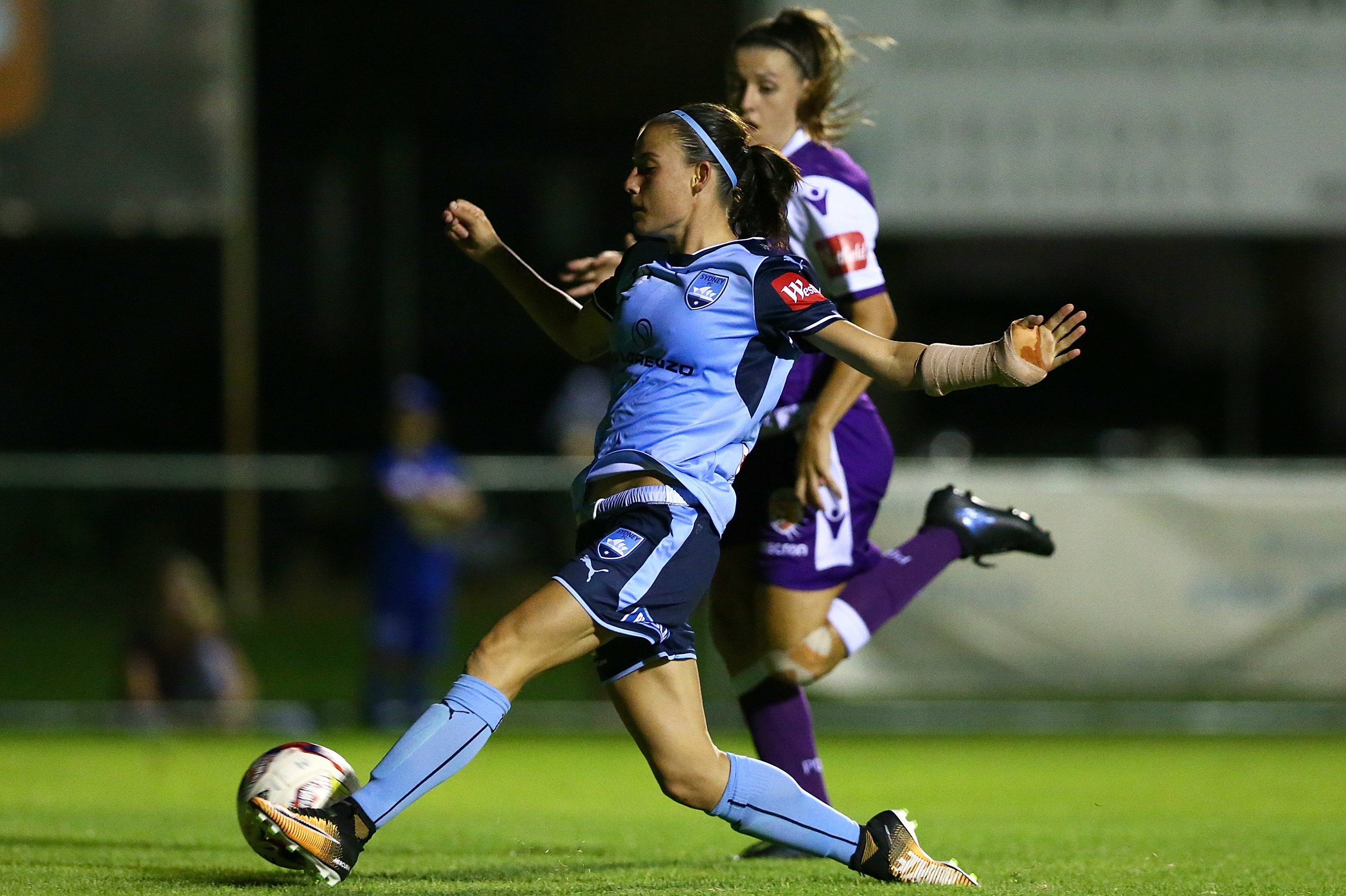 Chloe Logarzo sweeps home her goal in Sydney's win in the west.