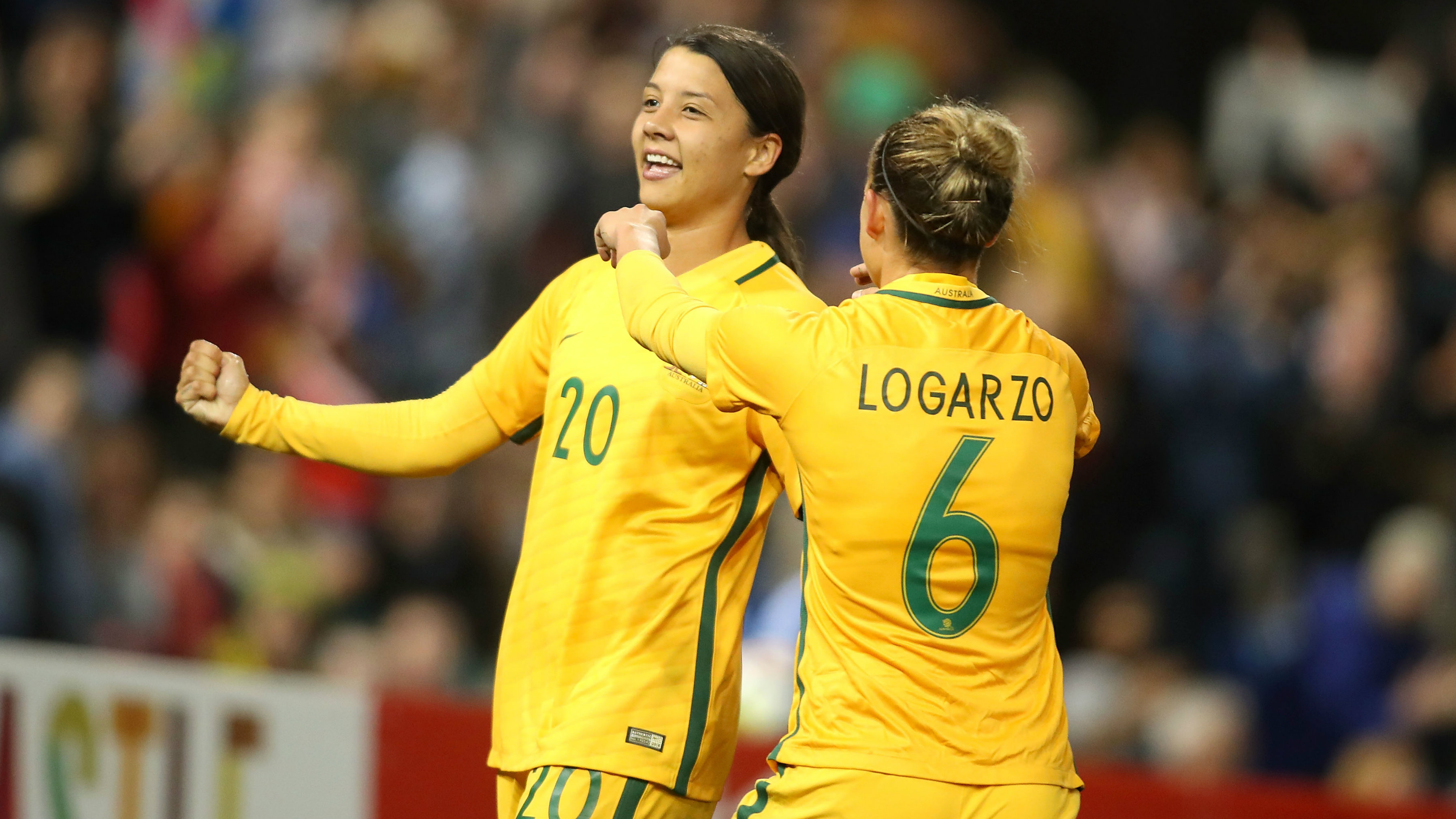 Sam Kerr and Chloe Logarzo celebrate a goal in the win over Brazil in Newcastle.