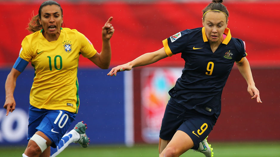 Matildas fullback Caitlin Foord wins the ball in front of Brazilian superstar Marta.