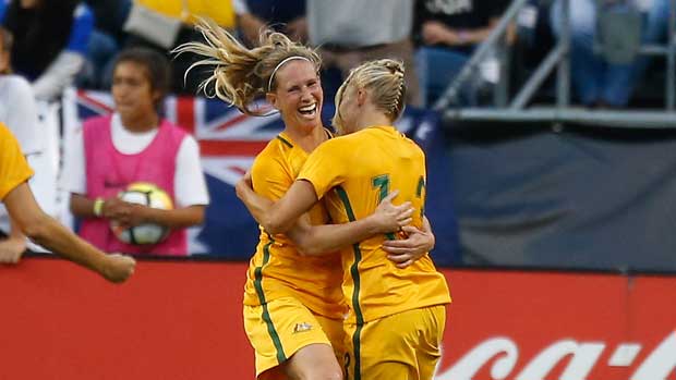 Elise Kellond-Knight celebrates with Tameka Butt after a Westfield Matildas goal at the recent Tournament of Nations.
