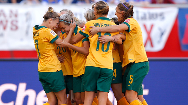 Matildas players celebrate a goal against Nigeria at the 2015 FIFA World Cup.