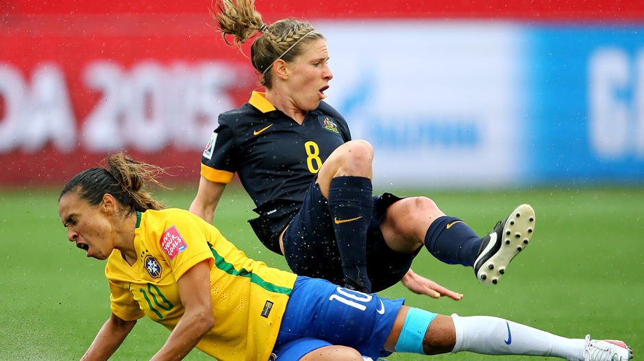 Elise Kellond-Knight fights for the ball with Brazilian superstar Marta.