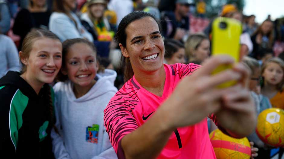 Goalkeeper Lydia Williams takes a selfie with a lucky fan.