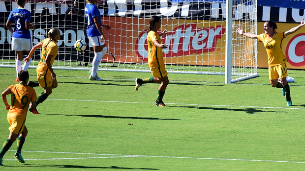 Matildas players celebrate a goal in their 6-1 win over Brazil at the Tournament of Nations.